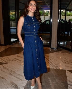 Kiara Advani looks glamorous in her denim dress and white high heels 